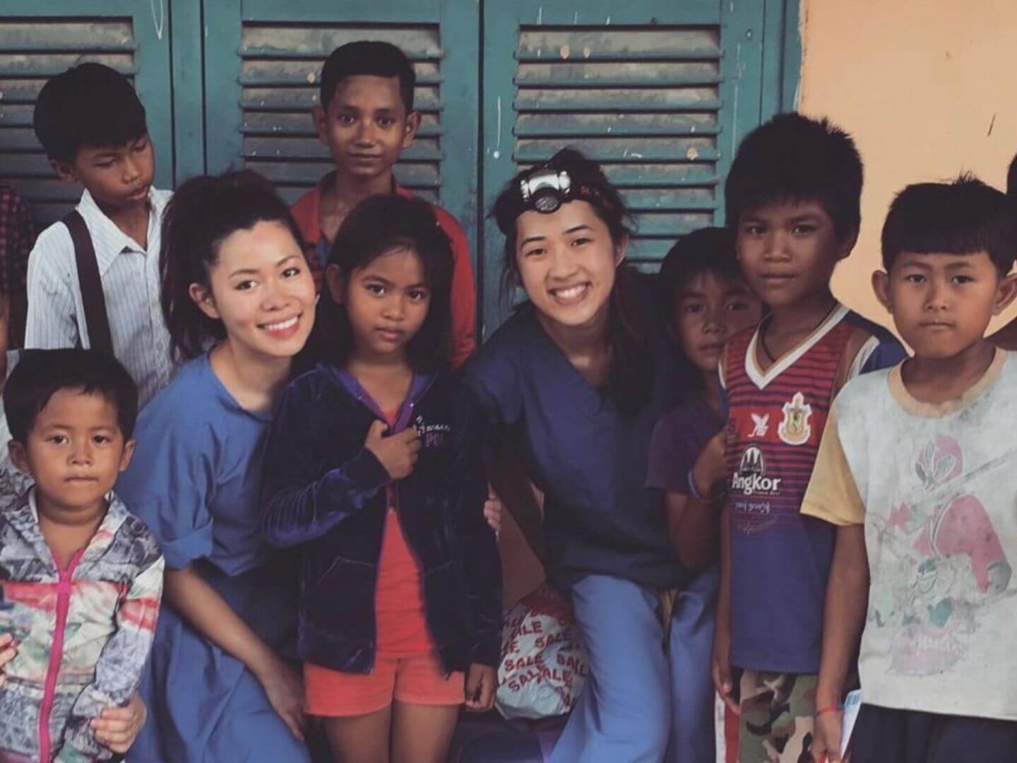 Dr Angela Nguyen volunteering at an orphanage in Cambodia